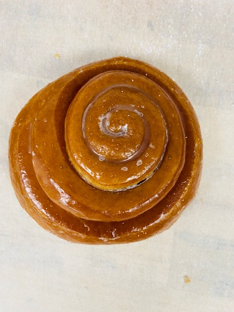 Order Cinnamon Roll food online from Highland Donuts store, Bakersfield on bringmethat.com