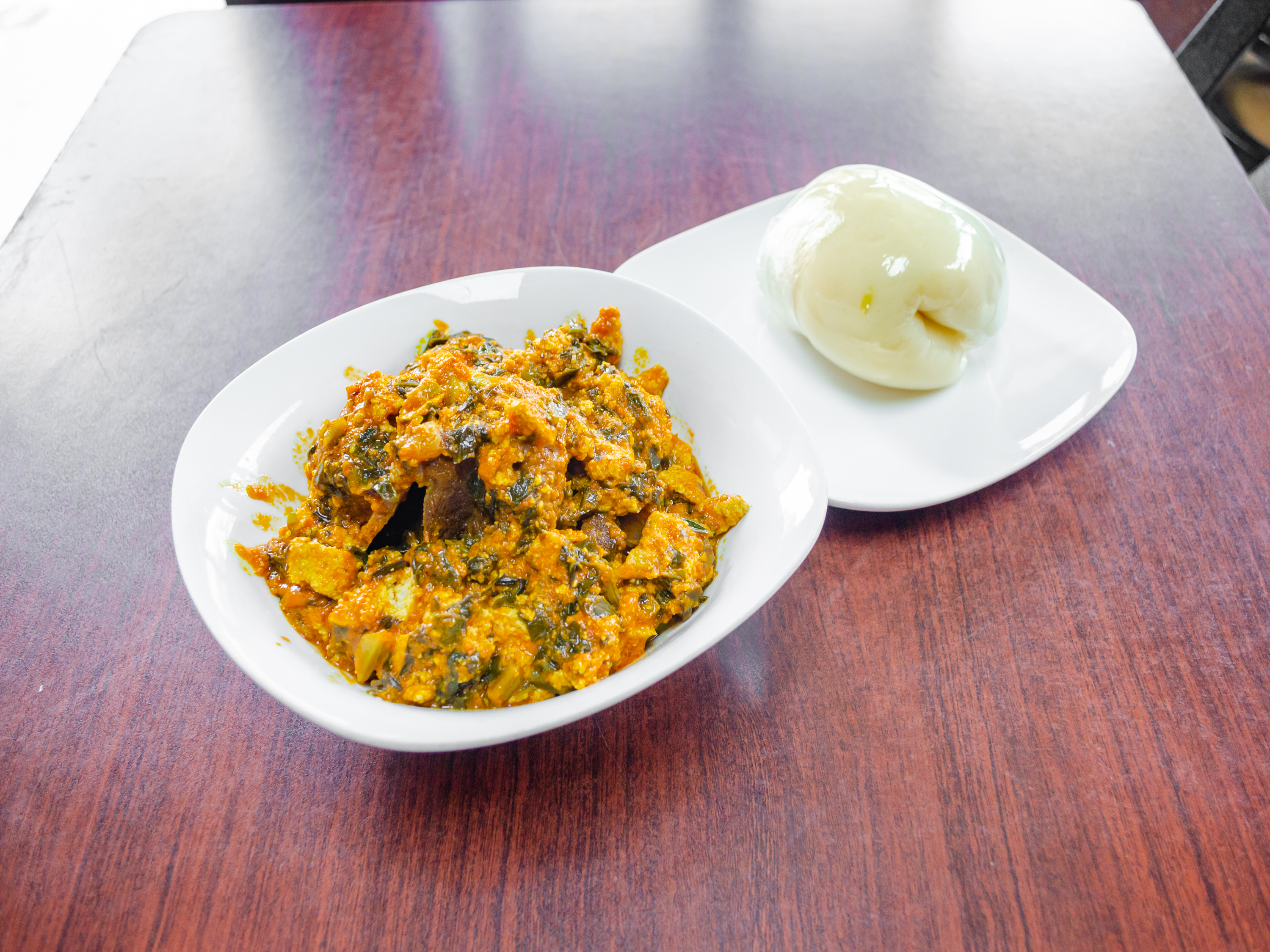 Order Egusi  food online from Eatwell African Cuisine store, Irvington on bringmethat.com