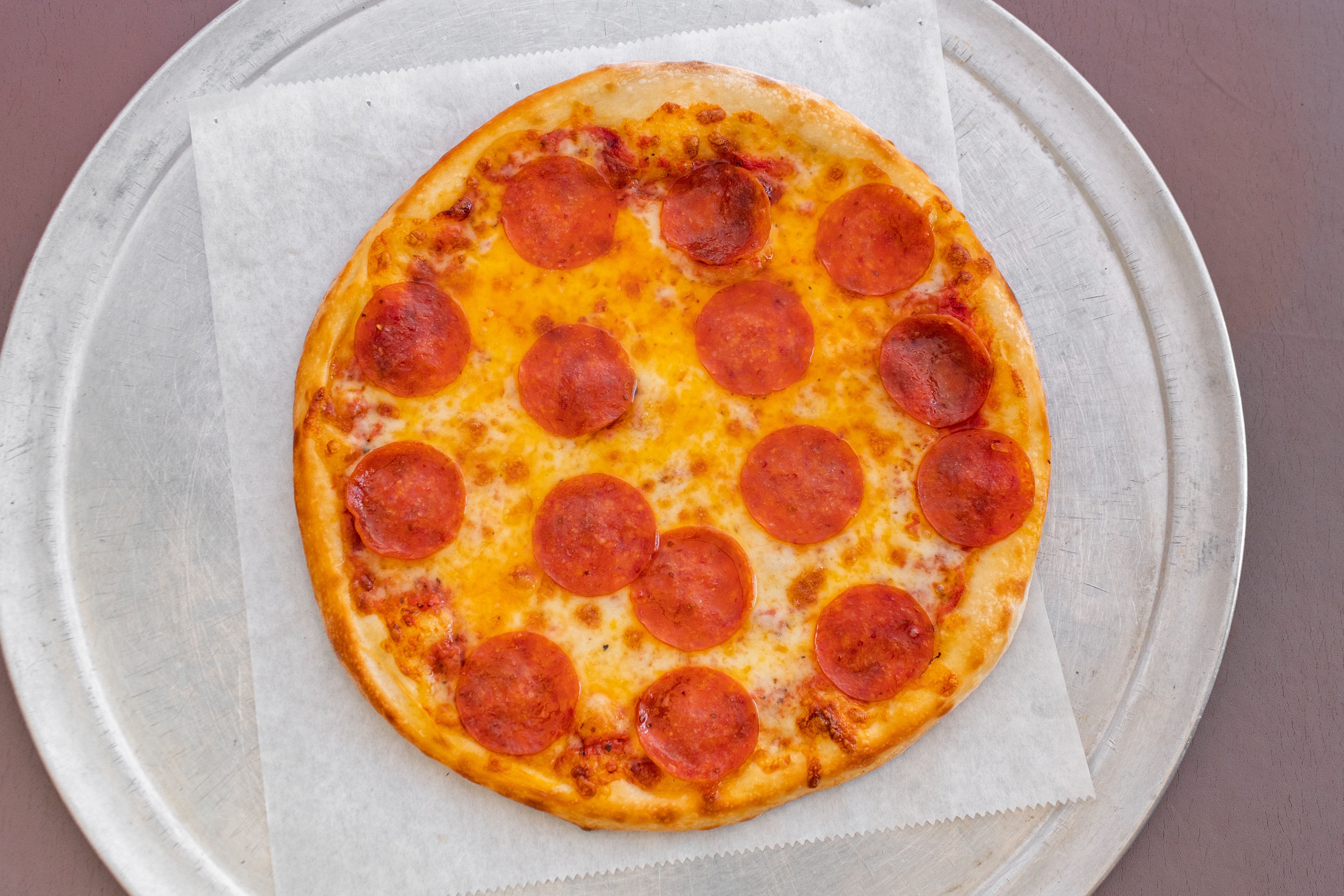 Order Classic Pepperoni Pizza - Medium 12'' (6 Slices) food online from Johnnie's NY Pizza store, Venice on bringmethat.com