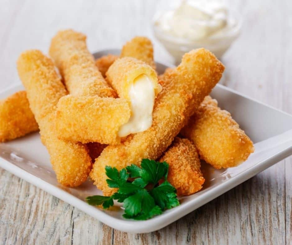 Order Mozzarella Sticks - 7 Pieces food online from Ellie's Pizza store, Beverly Farms on bringmethat.com