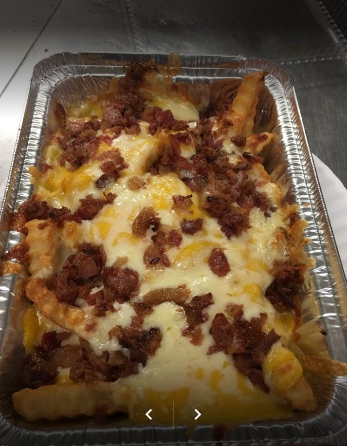 Order Cheesy Fries with Bacon - Appetizer food online from Bryantville Pizza Kitchen store, Pembroke on bringmethat.com