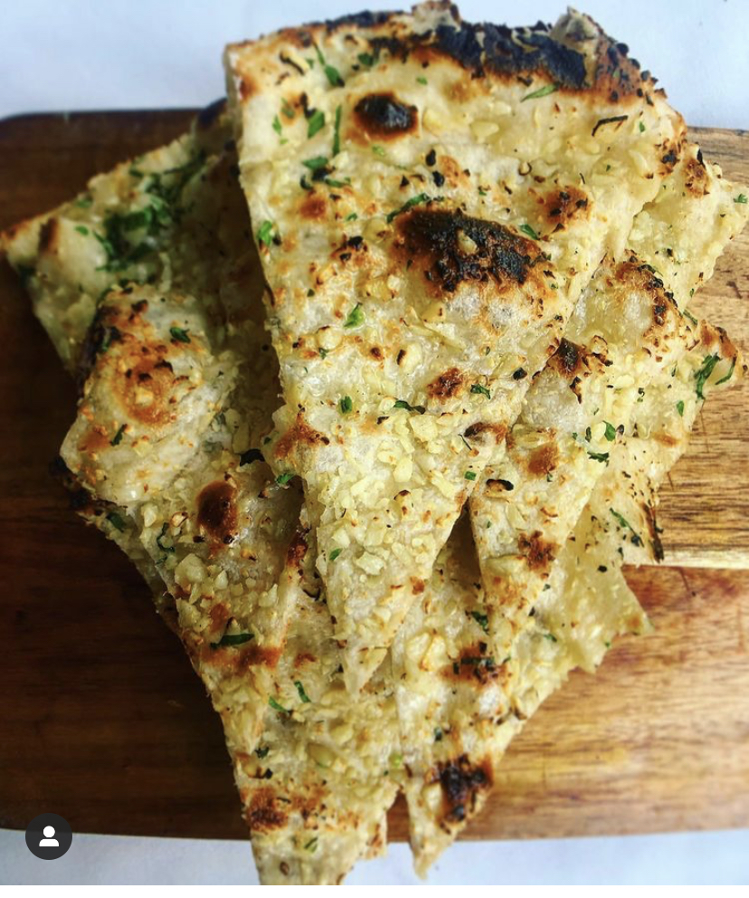Order Garlic Naan food online from Amiya Indian Cuisine store, Jersey City on bringmethat.com