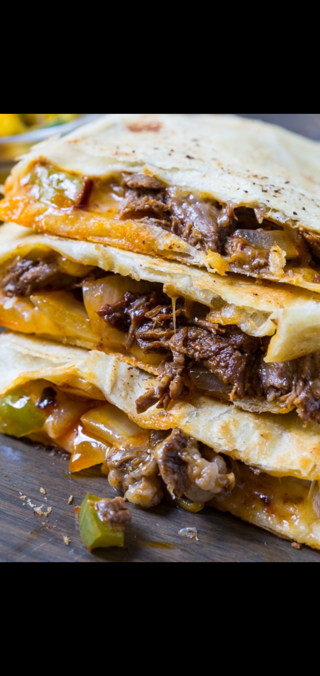Order Spicy Jalapeños Beef Quesadilla (spicy beef cheddar & pepper  jack cheese with jalapeños salsa & side sour cream) food online from American Gourmet Foods Deli store, New York on bringmethat.com