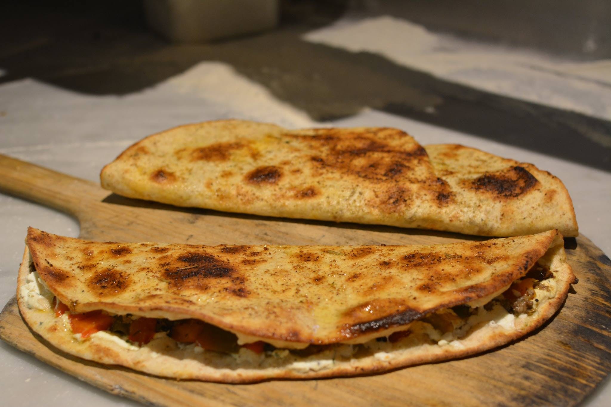 Order Calzone - Personal food online from Lucoli store, Red Hook on bringmethat.com