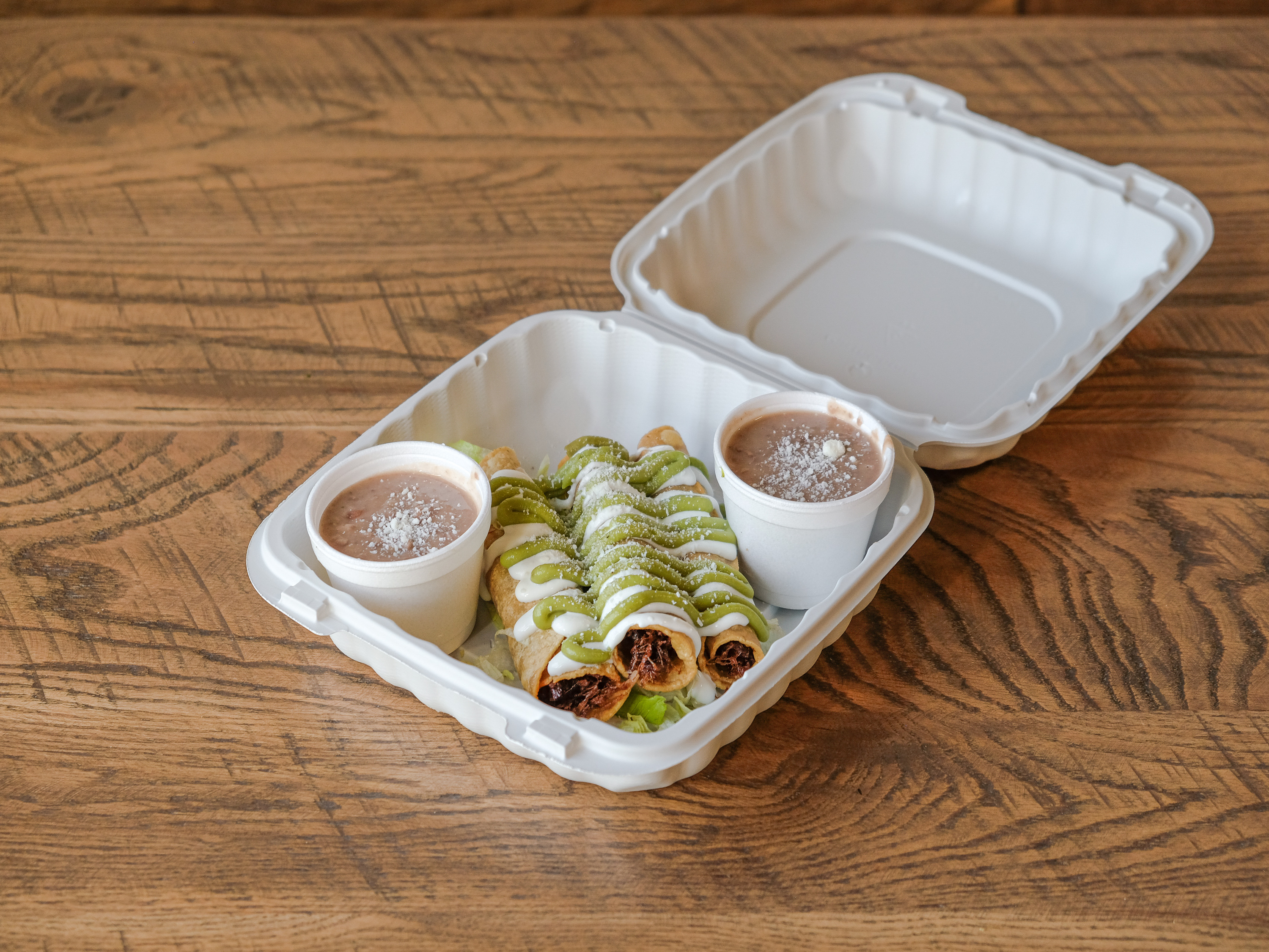 Order 3 Large Rolled Tacos food online from Taco Lounge store, Chula Vista on bringmethat.com