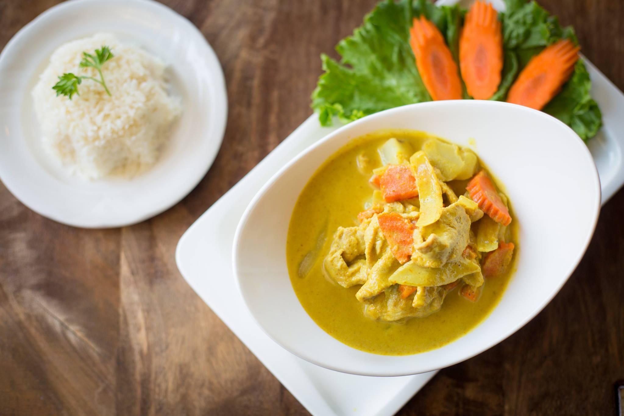 Order Yellow Curry (served with jasmine rice) food online from Chaiya thai restaurant store, San Francisco on bringmethat.com