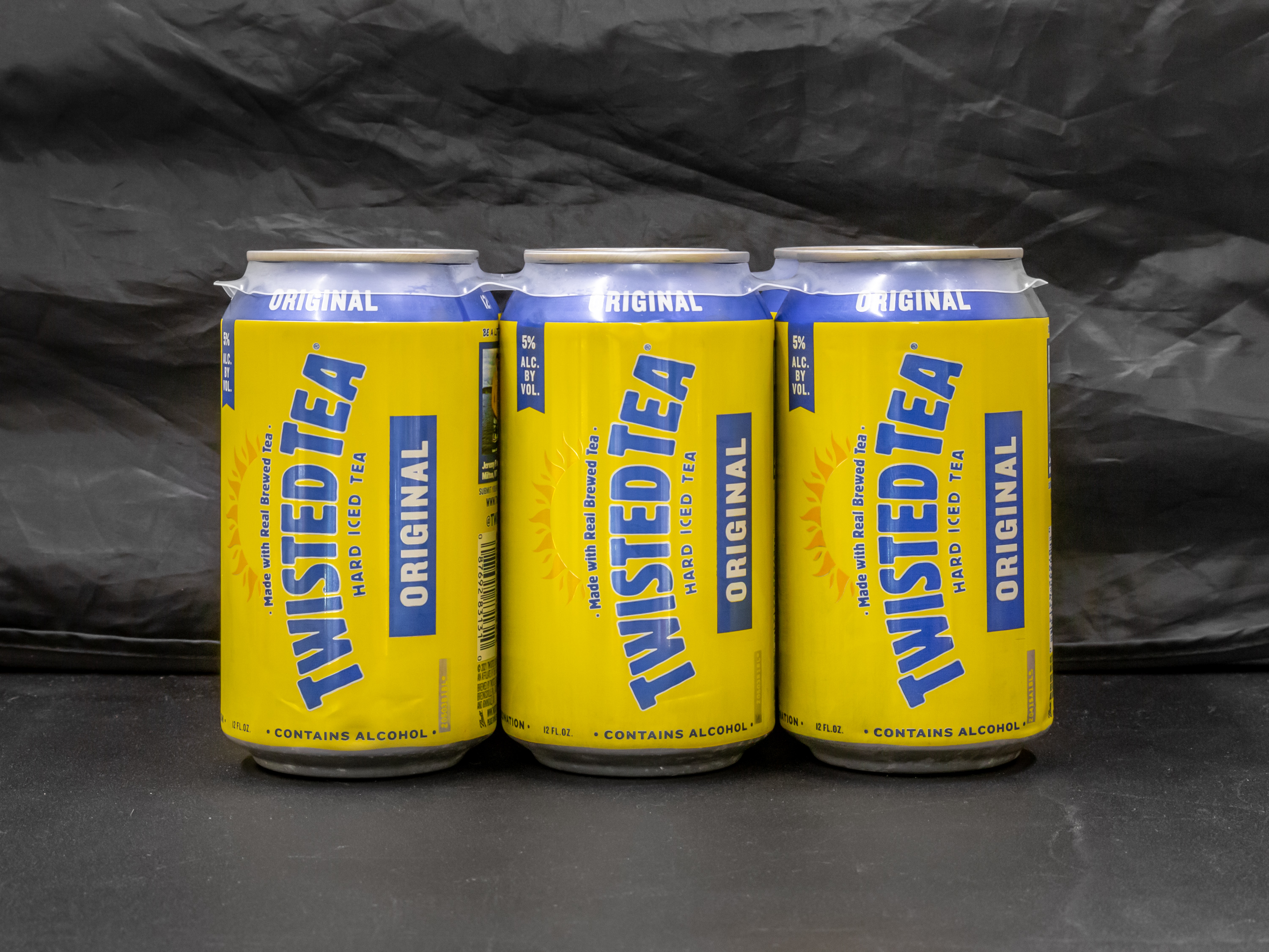 Order Twisted Tea Original,6pk-12 oz. Canned Beer (5.0% Abv) food online from Gold Crown Liquors store, Chicago on bringmethat.com
