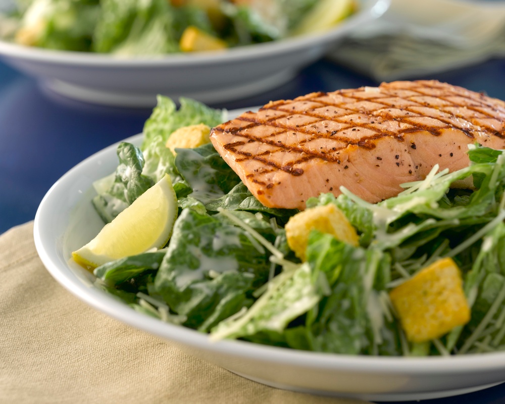 Order Caesar Salad with Grilled Wild Alaskan Salmon food online from Ivar store, Bellevue on bringmethat.com