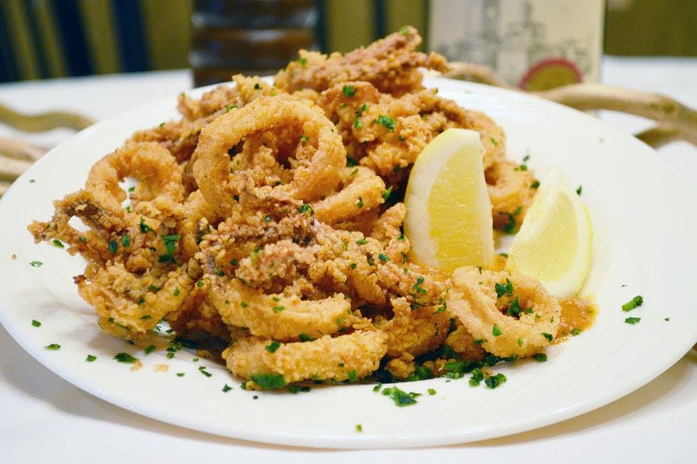 Order Fried Calamari - Appetizer food online from Vazzy's 19th Hole store, Fairfield on bringmethat.com