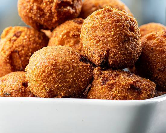 Order Hush Puppies (15 Pcs) food online from Sharks Fish & Chicken store, Bridgeview on bringmethat.com