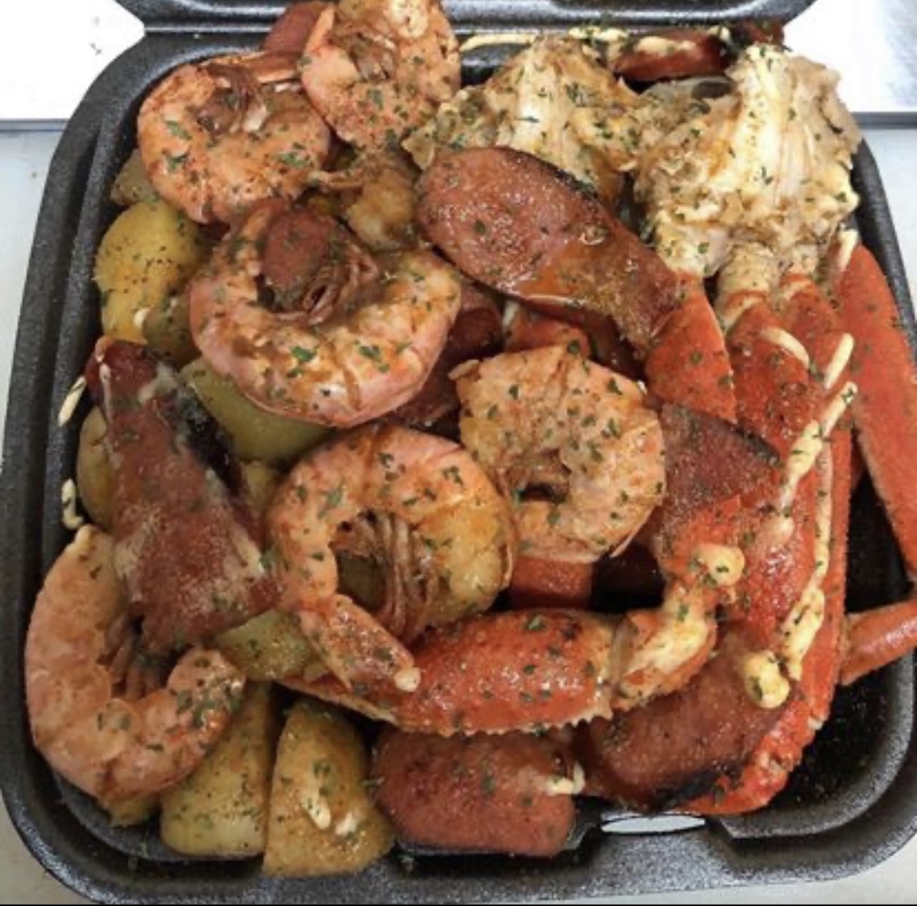Order #12 2 Crab Cluster with corn & potatoes  food online from Da Red Wagon Express store, Flint on bringmethat.com
