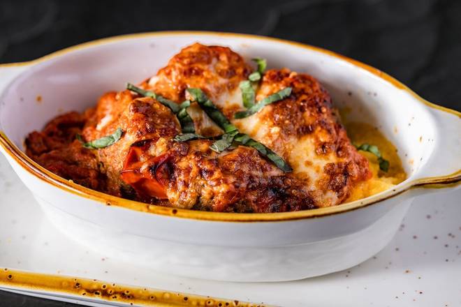 Order Baked Meatball Polenta food online from Brixx Wood Fired Pizza store, Raleigh on bringmethat.com
