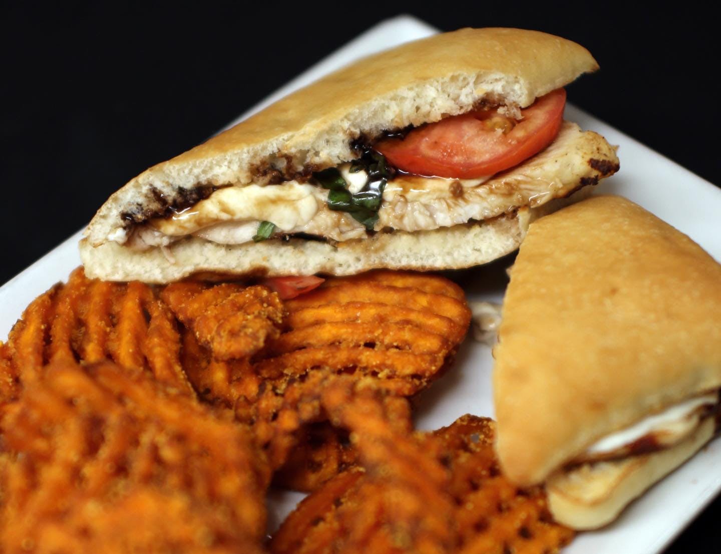 Order Chicken Caprese Ciabatta Sandwich - Sandwich food online from Wixom Station store, Wixom on bringmethat.com