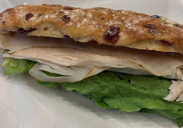 Order Turkey Cranberry Panini food online from L'Artisan Cafe &amp; Bakery store, Providence on bringmethat.com