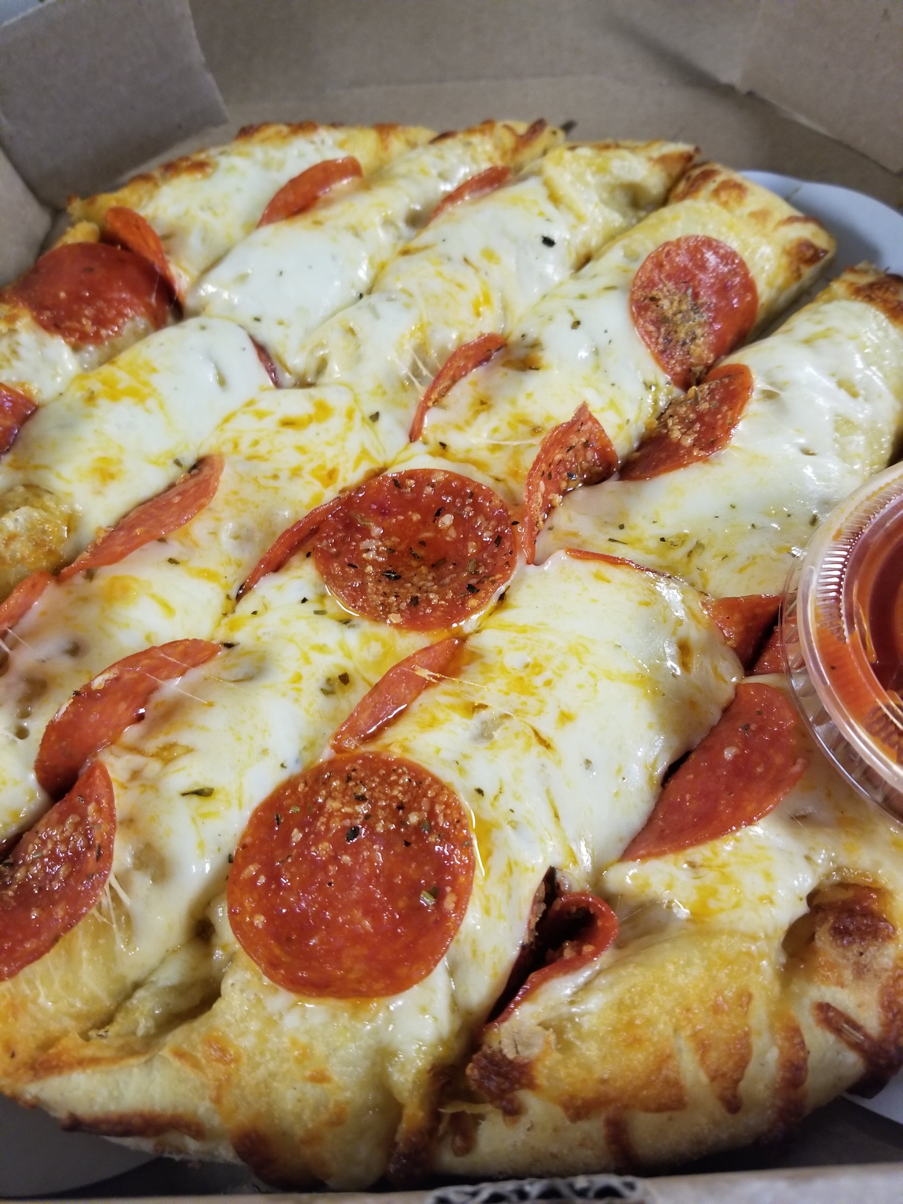 Order Breadsticks with Cheese & Pepperoni - Breadstick food online from Novotny's Groceries & Pizza store, Worthington on bringmethat.com