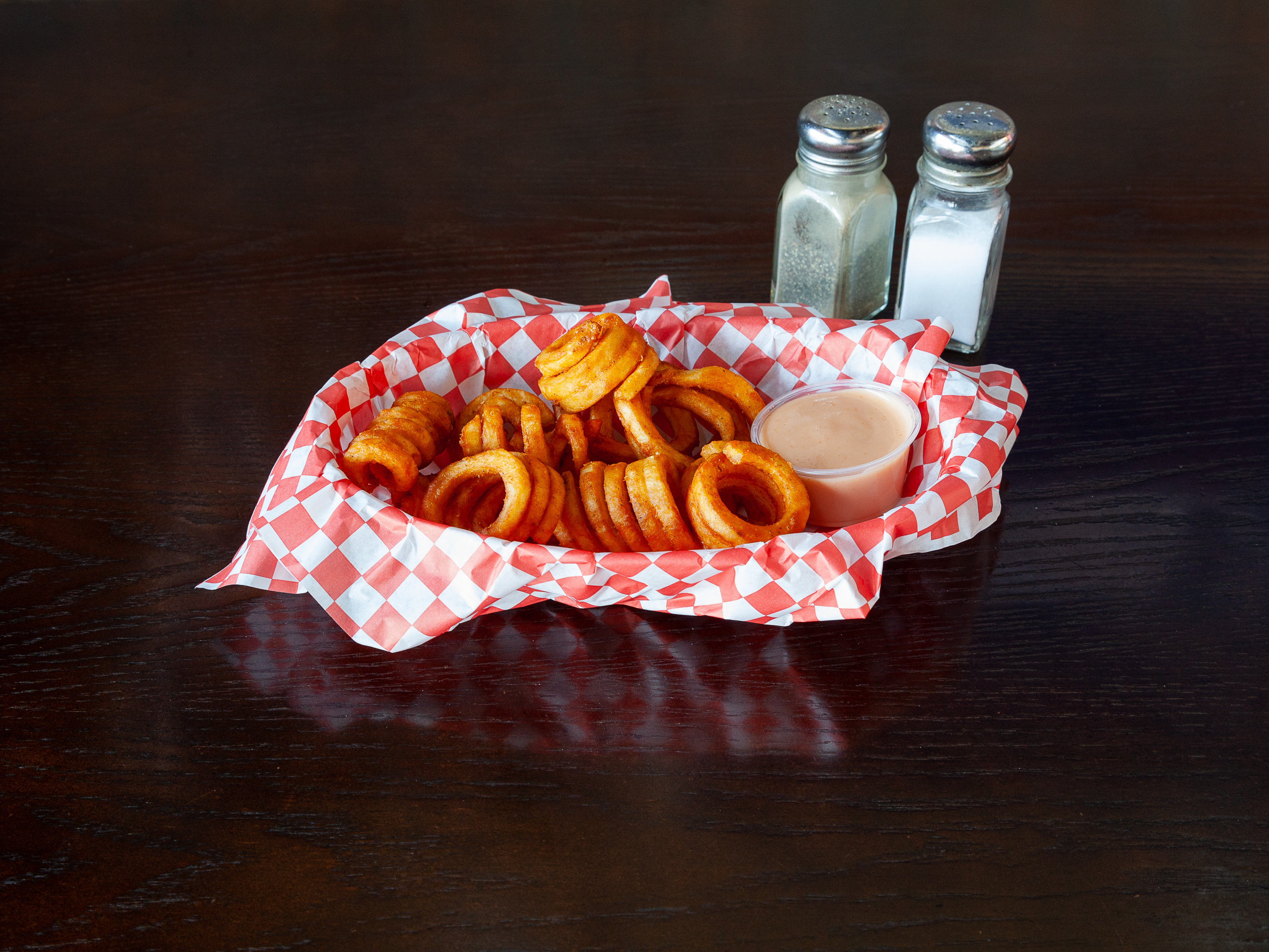 Order Seasoned Curly Fries food online from Burger Madness Seattle store, Seattle on bringmethat.com