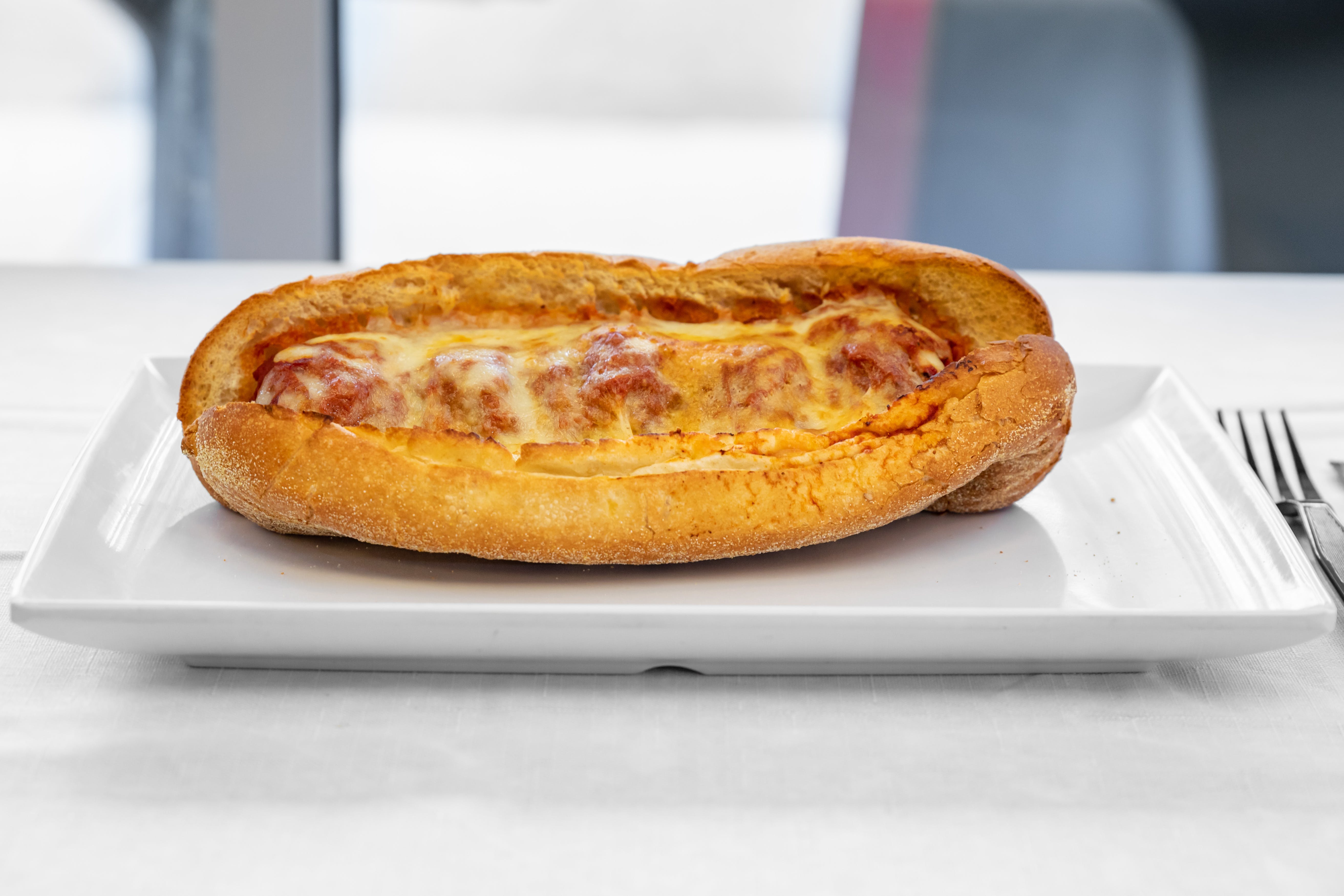 Order Meatball Parmigiana Grinder - Half food online from Giove's Pizza store, Trumbull on bringmethat.com