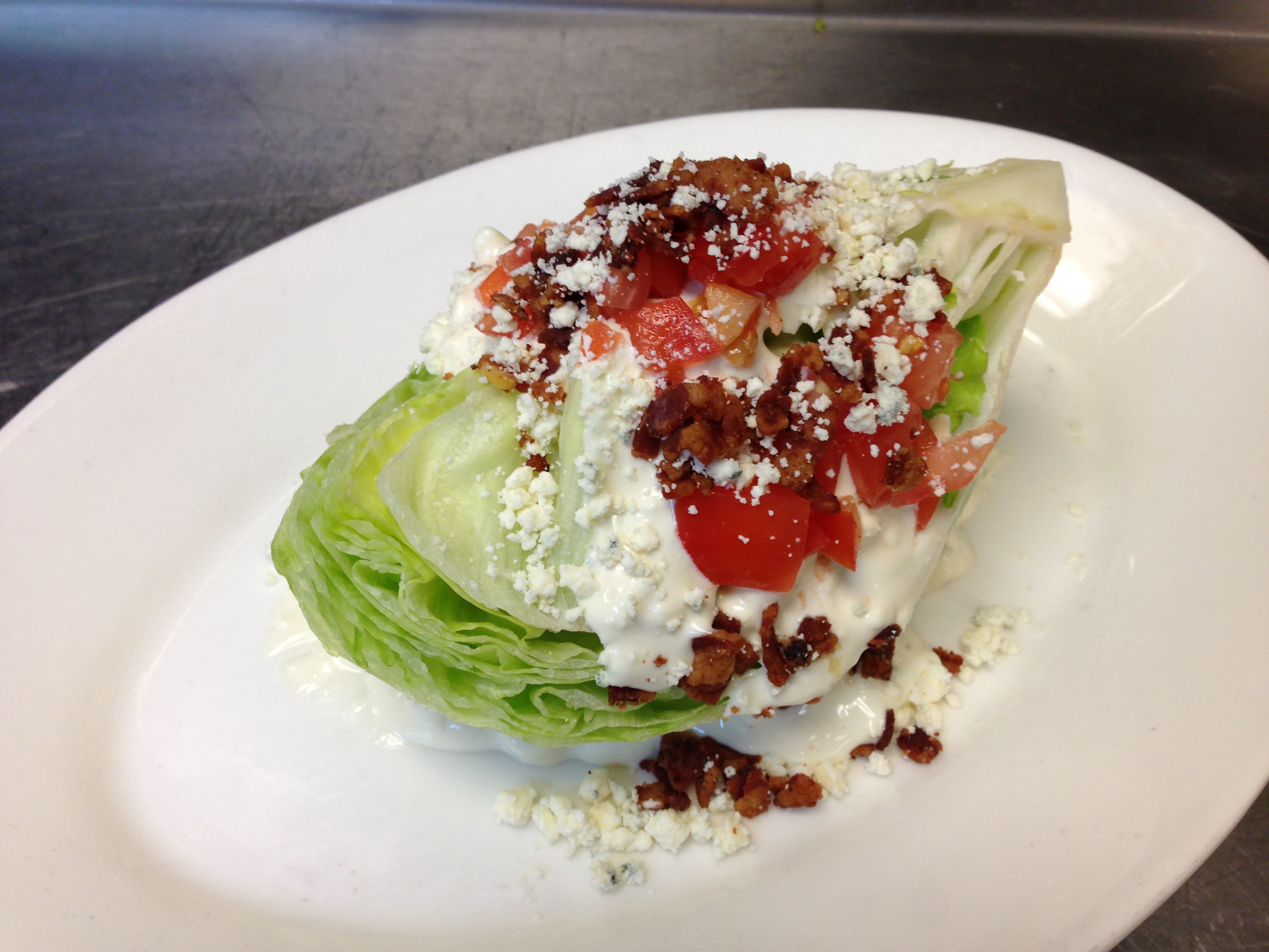 Order BLT Wedge Salad  food online from Harry Caray Italian Steakhouse store, Lombard on bringmethat.com