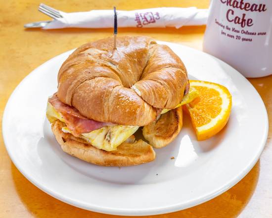 Order Croissant Filled with Ham, Egg, and Cheese food online from Chateau Coffee Cafe store, Kenner on bringmethat.com