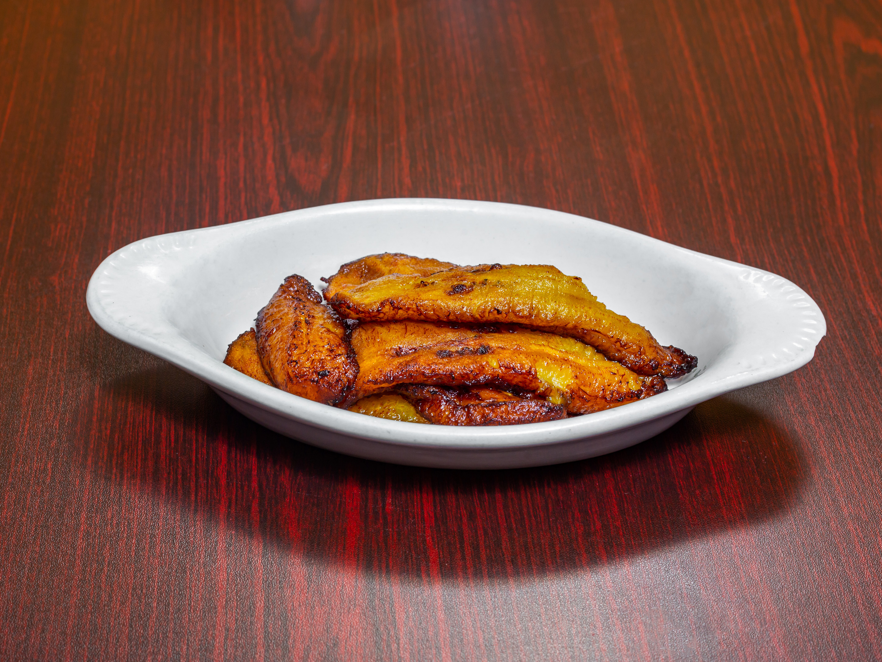 Order Fried Plantain food online from Malakhi Lounge & Jamaican Restaurant store, Manassas on bringmethat.com