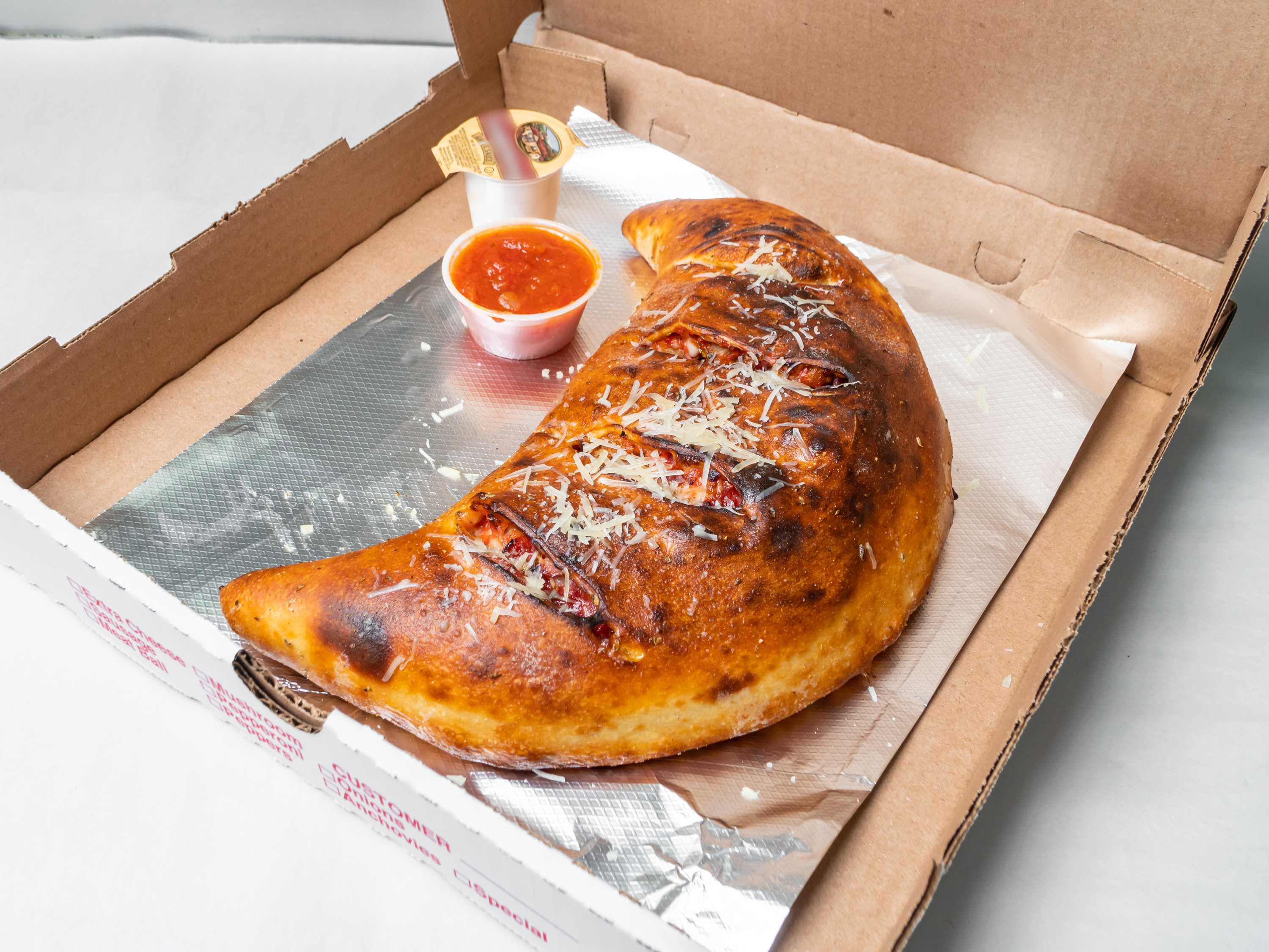 Order Meat Delight Calzone food online from The Spot store, Baltimore on bringmethat.com