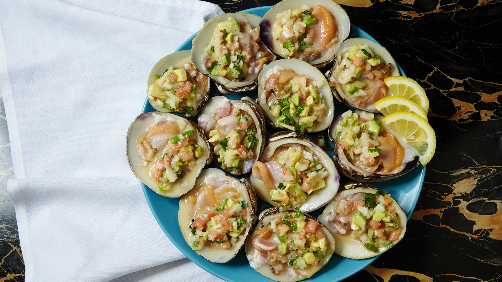 Order 47. Clams in Spanish Style food online from Jamaica fish market store, Richmond Hill on bringmethat.com