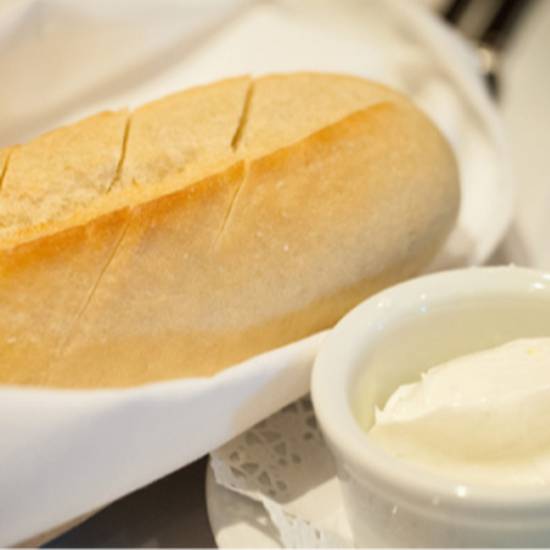 Order French Bread Loaf food online from Ruths Chris Steak House store, Birmingham on bringmethat.com