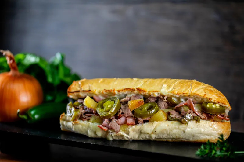 Order Spicy Hawaiian Philly food online from Ski and Benny Pizza store, Anchorage on bringmethat.com