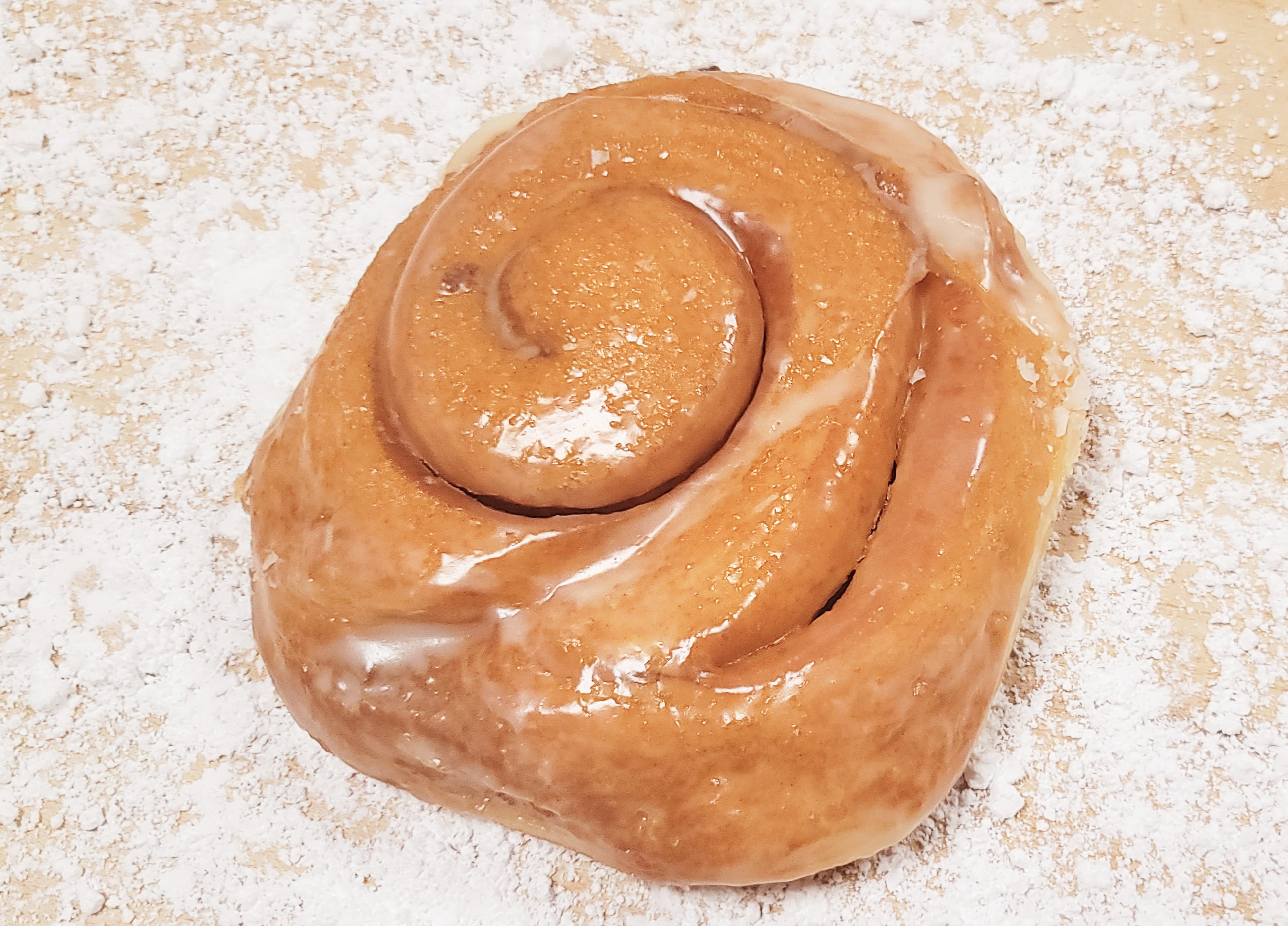 Order Cinnamon Roll food online from Golden Donuts store, National City on bringmethat.com