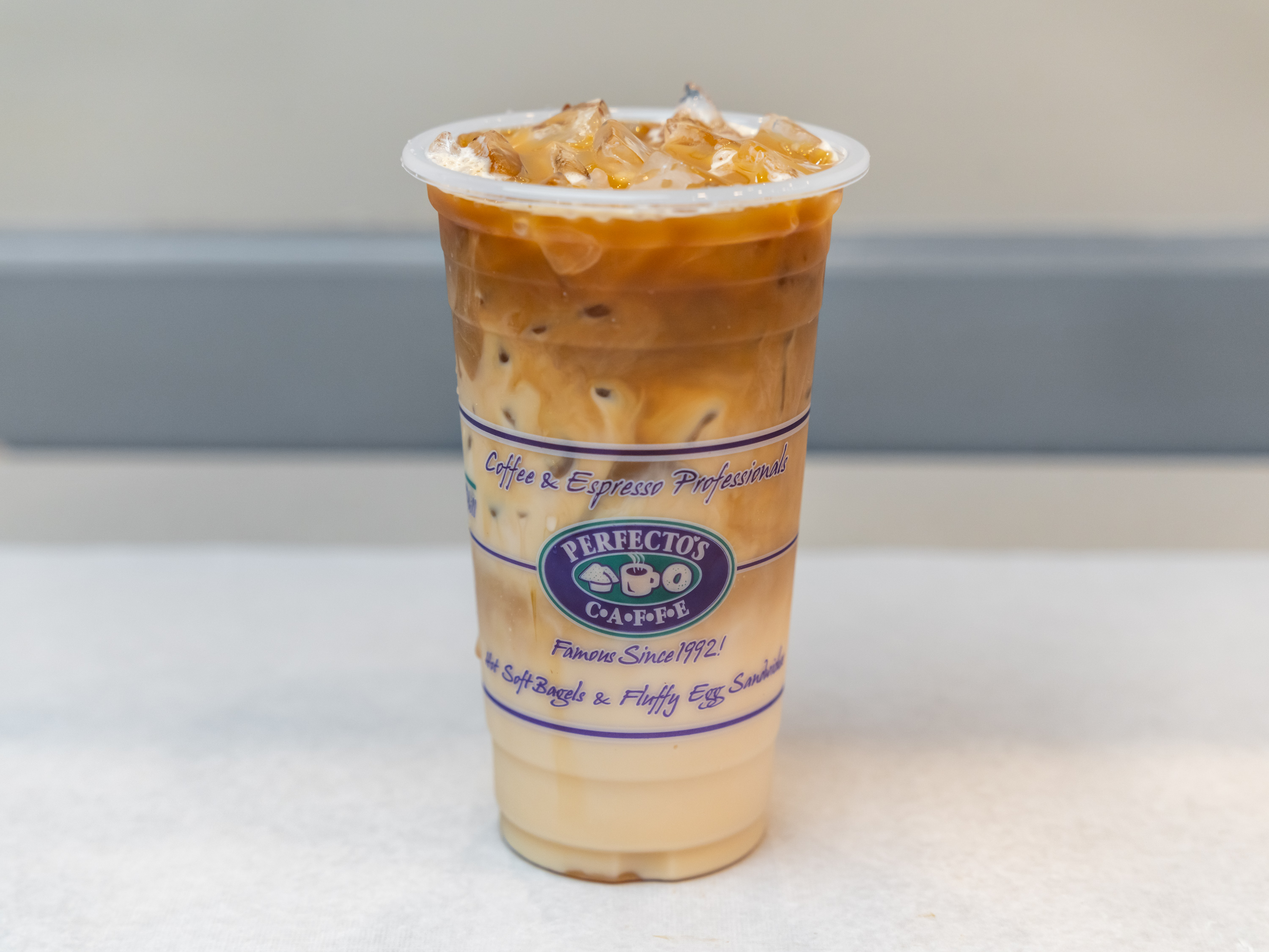 Order Iced Caramel Macchiato food online from Perfecto Caffe store, Peabody on bringmethat.com