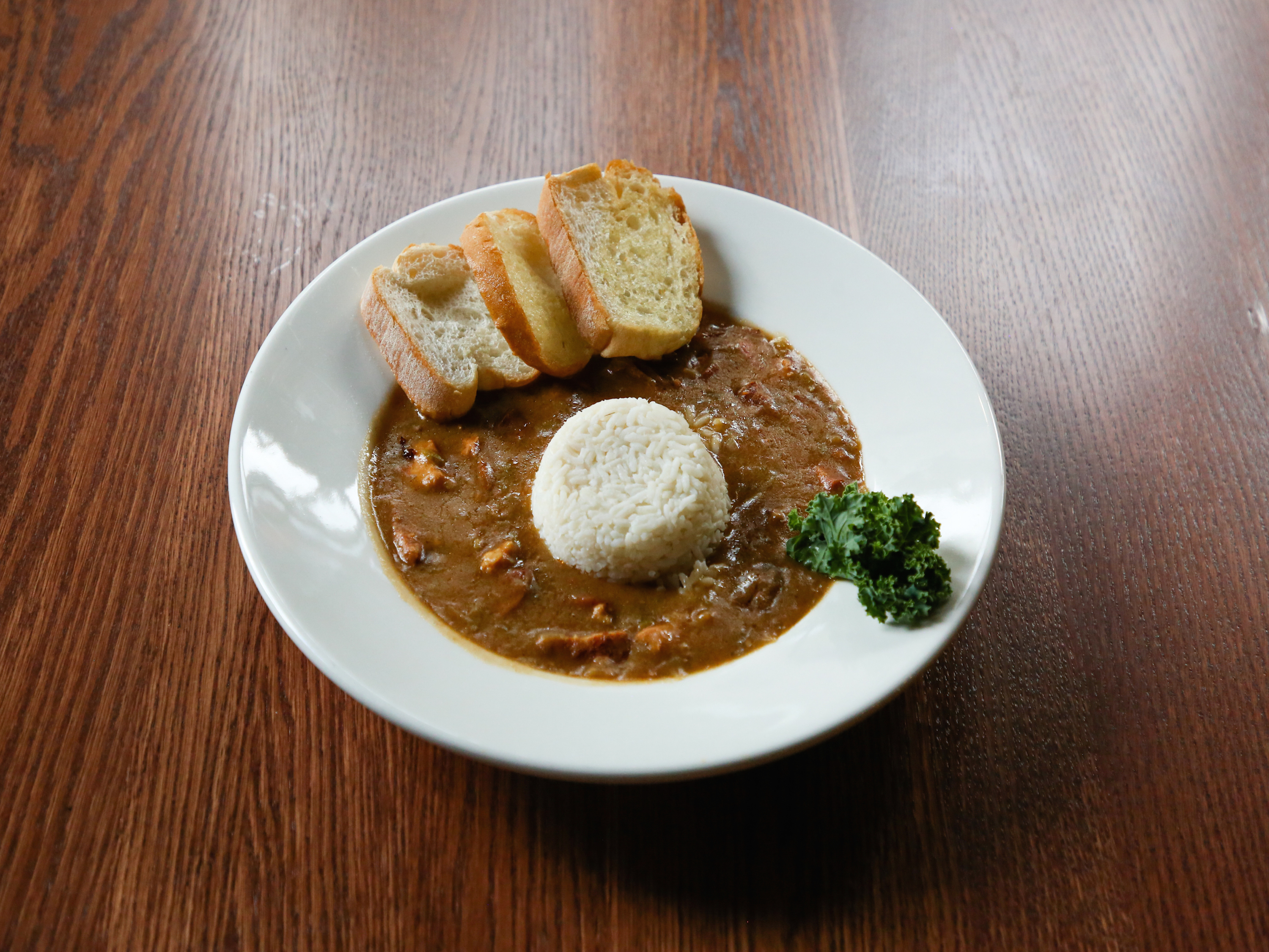 Order Chicken and Andouille Gumbo food online from Mambo store, New Orleans on bringmethat.com