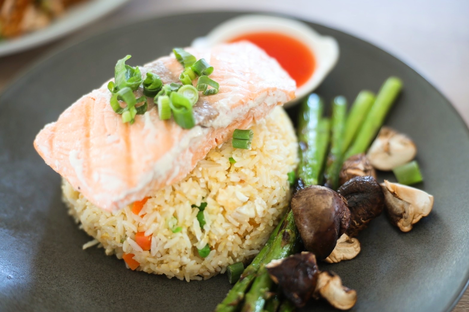 Order Kao Pad Kratium Salmon Lunch Special food online from Charm Thai Bistro store, Oakland on bringmethat.com
