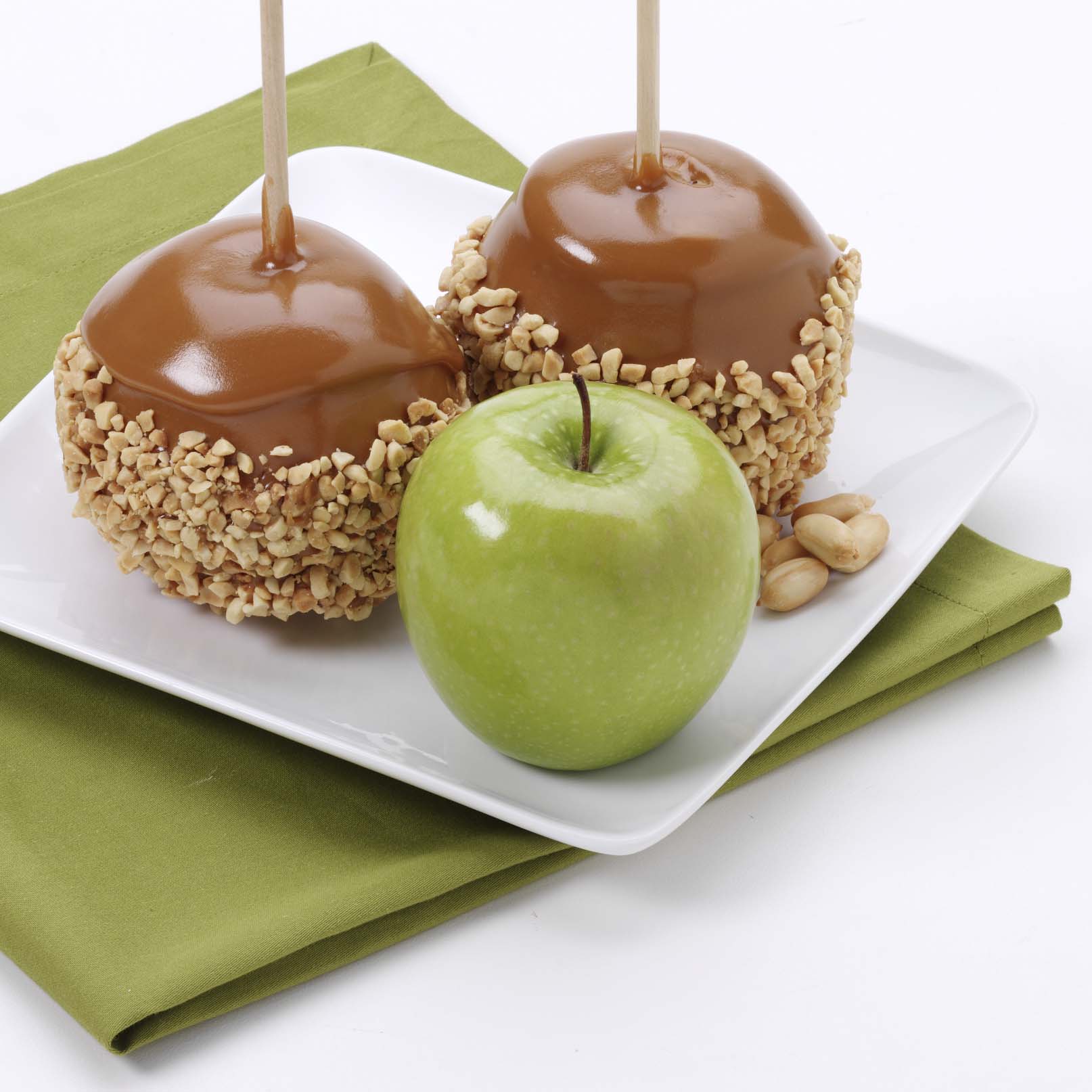 Order Caramel Apple with Peanuts food online from Russell Stover Chocolates store, Omaha on bringmethat.com