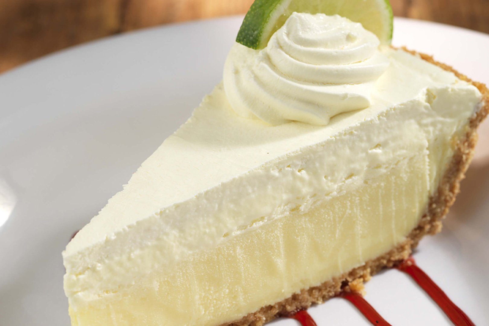 Order Key Lime Pie food online from Hooters store, Albuquerque on bringmethat.com