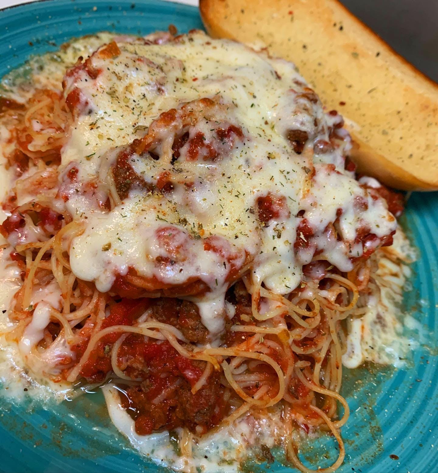 Order Spaghetti - Dinner food online from Holiday Pizza store, Statesboro on bringmethat.com