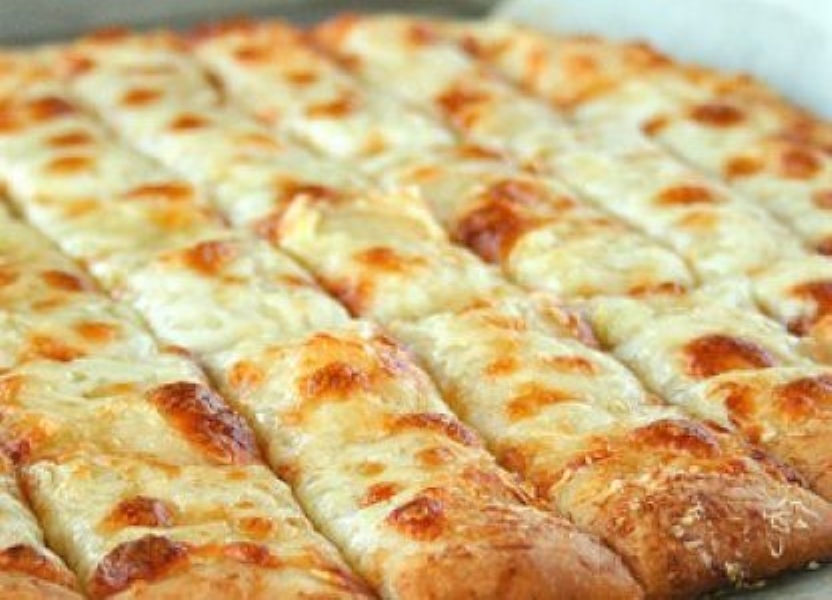 Order Baked Cheesy Garlic Bread food online from Italian Express store, Westwood Village on bringmethat.com
