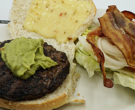 Order Guacamole Burger food online from Coach House Diner Restaurant store, North Bergen on bringmethat.com