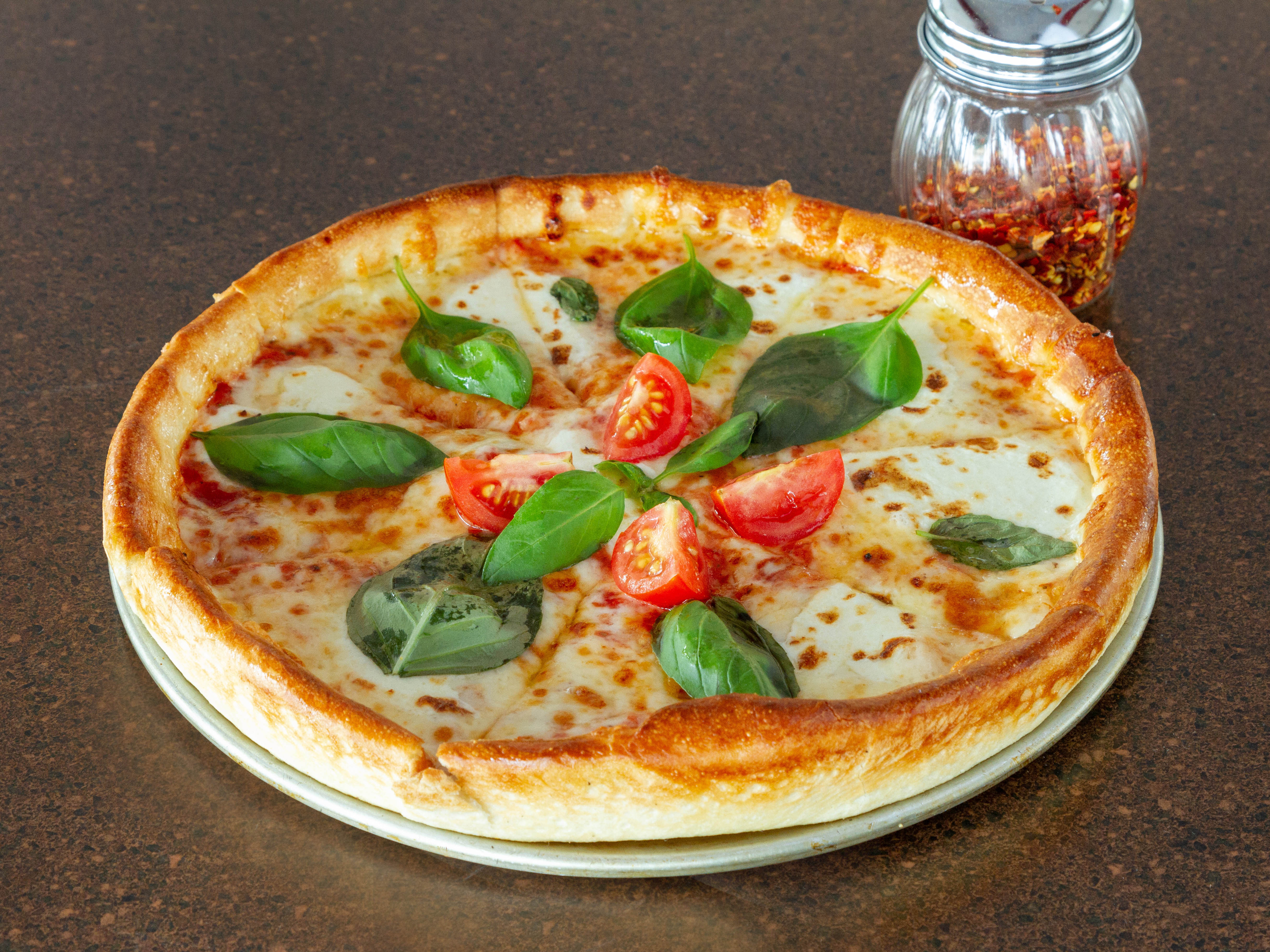Order Margherita Pizza food online from Go Grande Pizzeria store, Worcester on bringmethat.com