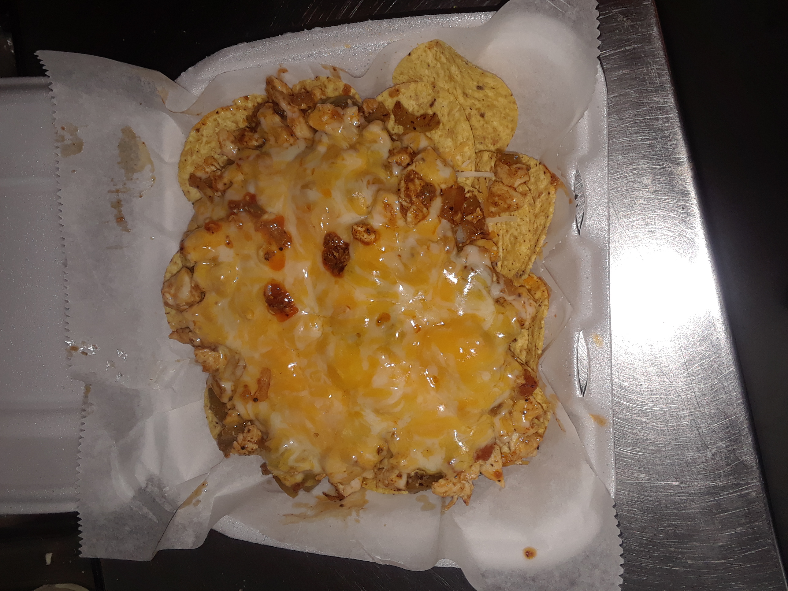 Order Chicken Nachos food online from Mike's Steakhouse store, Buffalo on bringmethat.com