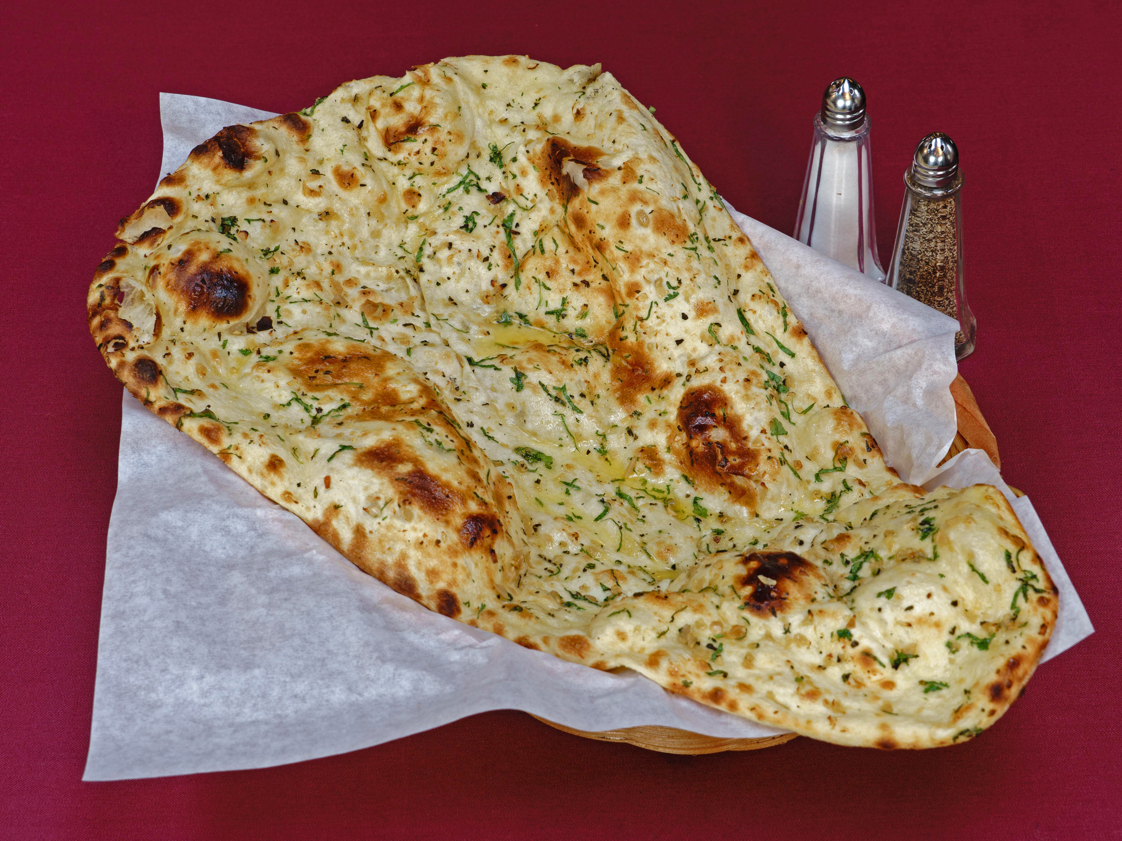 Order Garlic Naan food online from Taste of India - Seattle store, Seattle on bringmethat.com
