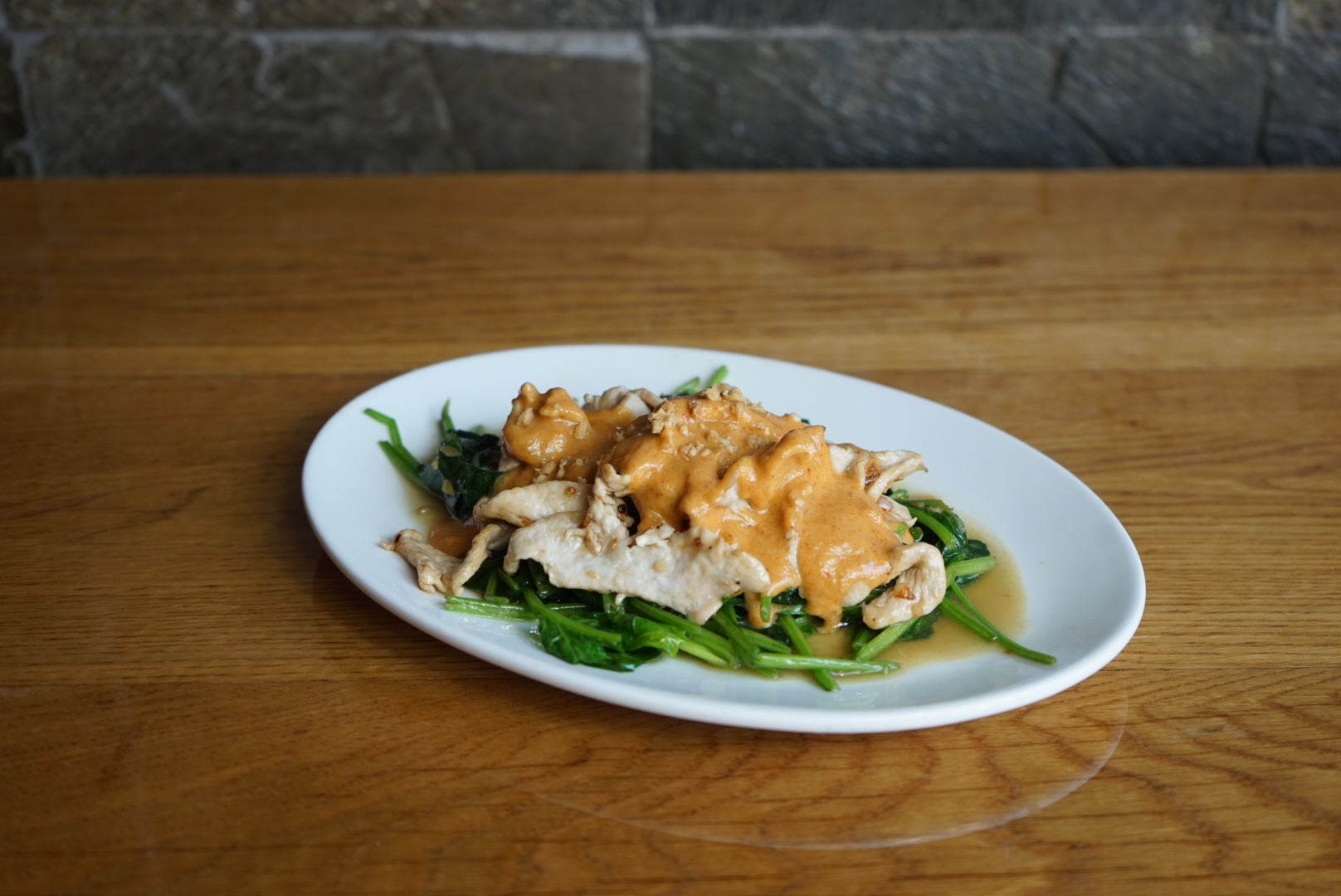 Order Spinach and Peanut Sauce food online from Lers Ros store, San Francisco on bringmethat.com