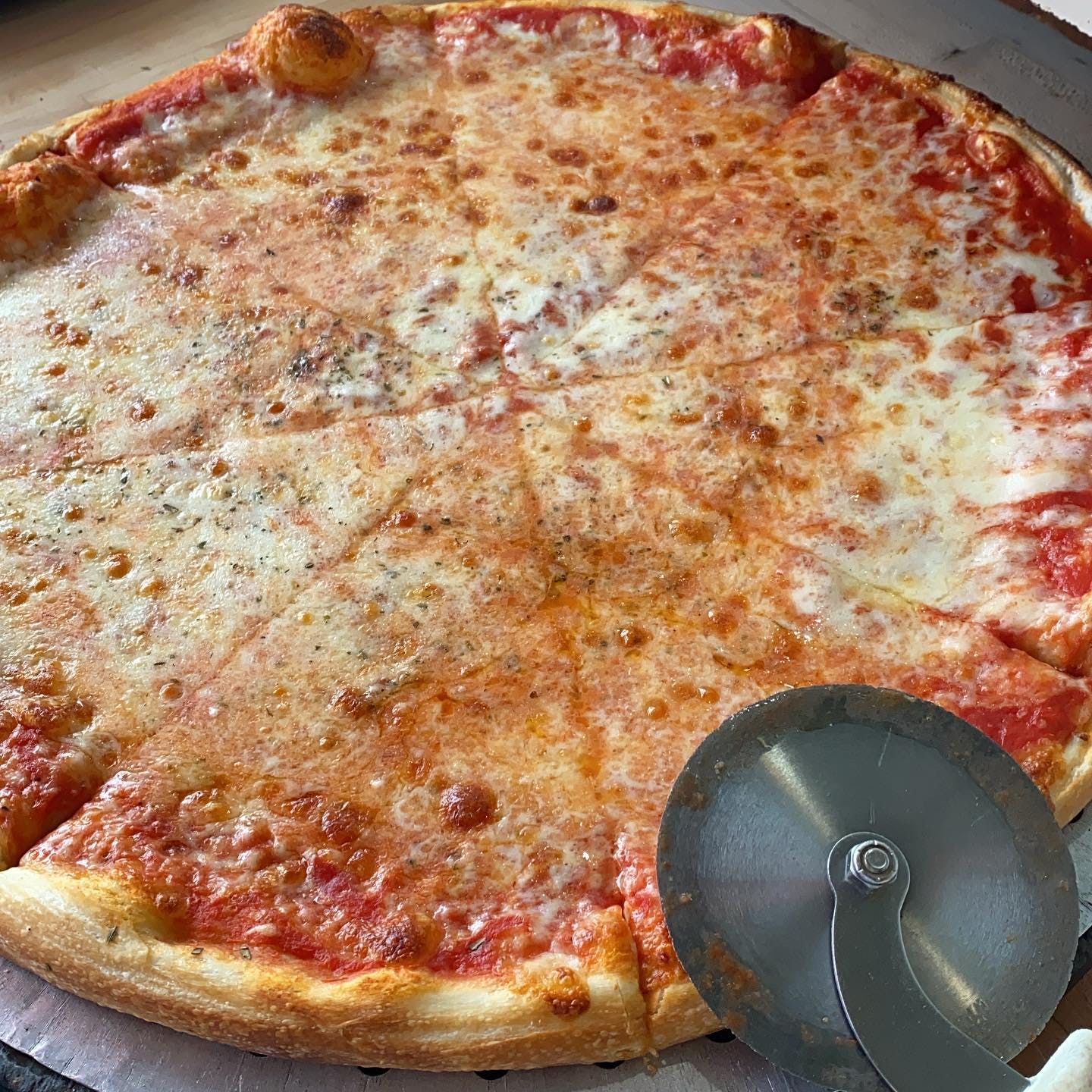Order Regular Pie - Pizza food online from Pizza Garden store, Flushing on bringmethat.com
