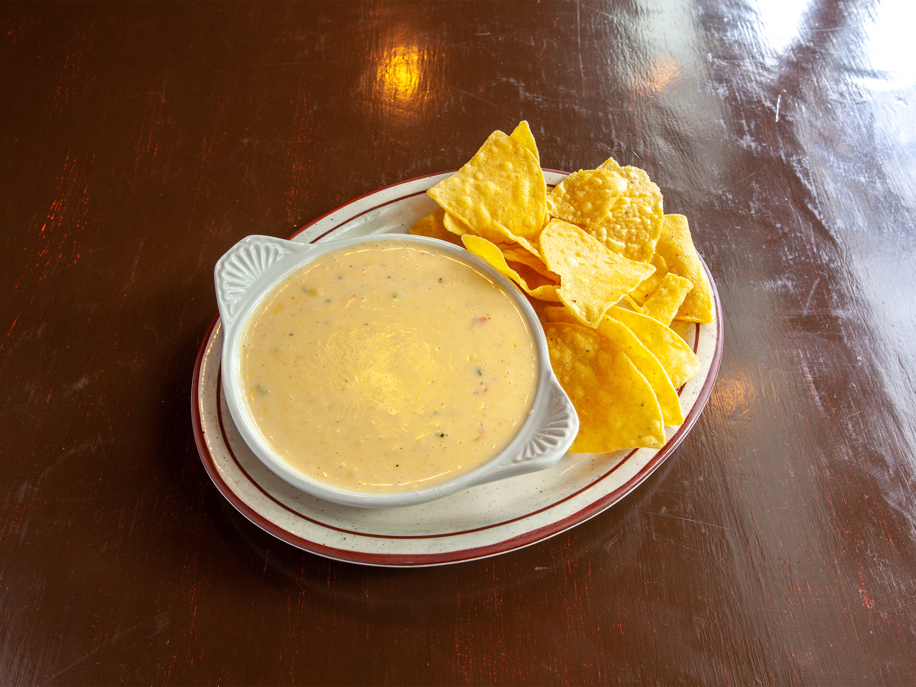 Order Chili con Queso food online from Tres Hombres Mexican Restaurant and Lounge store, Carbondale on bringmethat.com