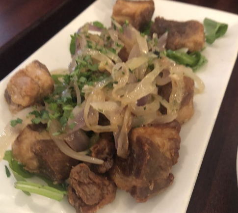 Order Sauteed Pork Chunks food online from Madera Cuban Grill store, Long Island City on bringmethat.com