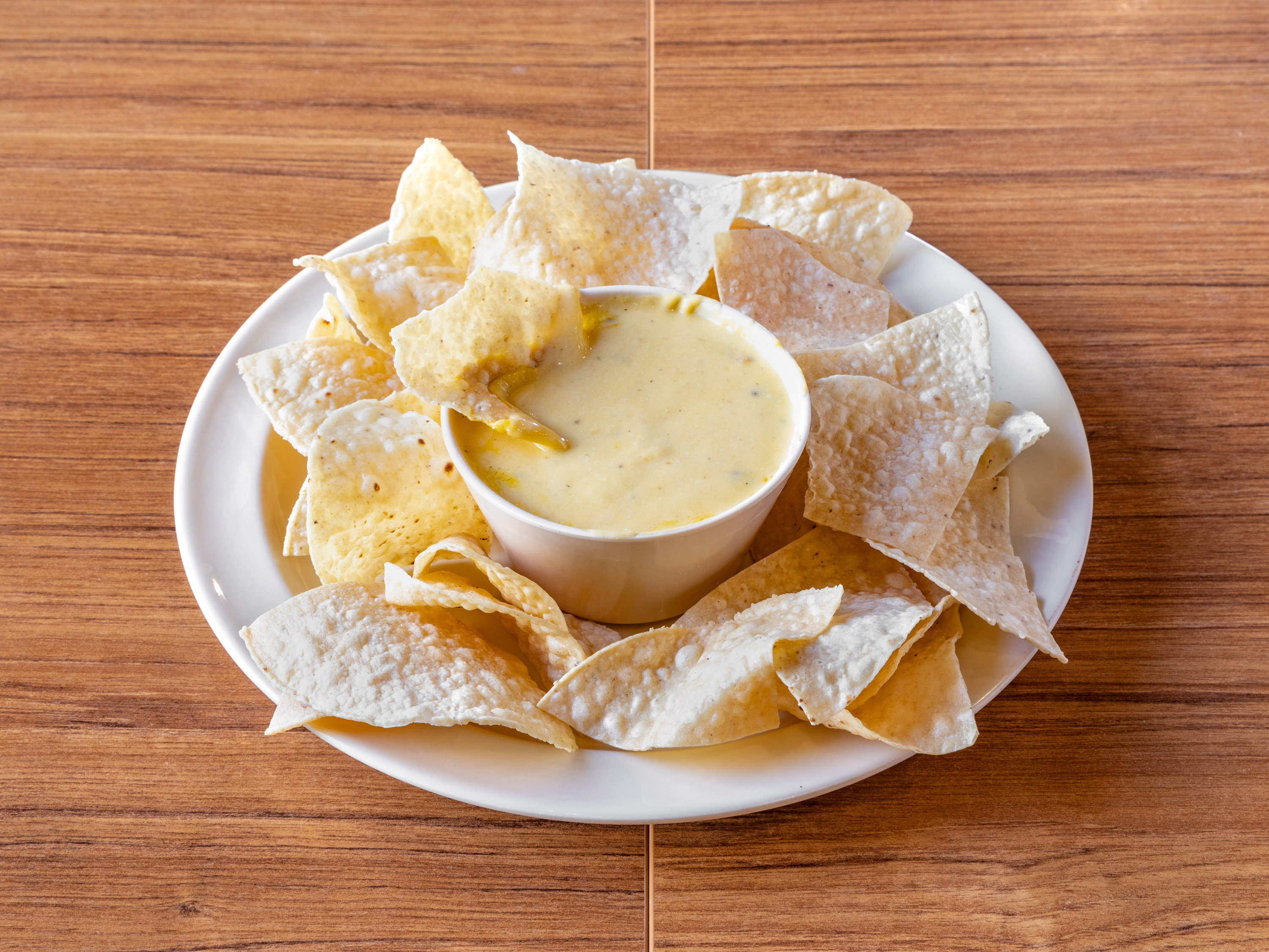 Order Queso Dip and Chips food online from Rudy Mexican Grill store, Mesa on bringmethat.com