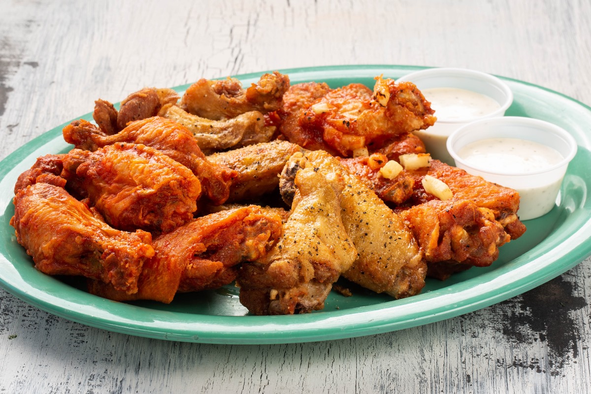 Order 40 Wings food online from Ojos Locos Sports Cantina store, Houston on bringmethat.com