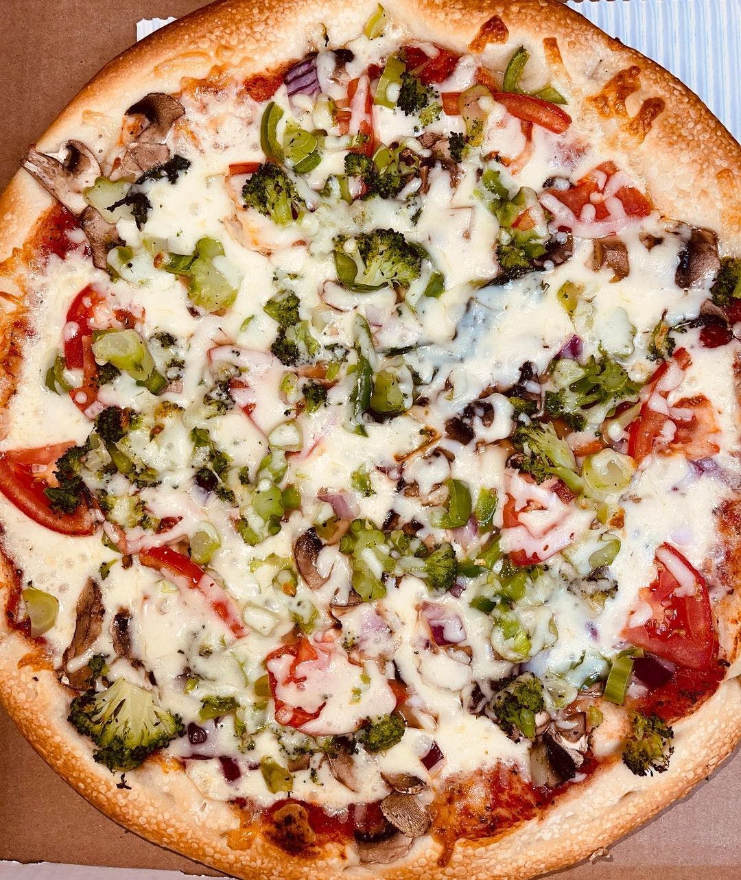 Order Veggie Lover's White Pizza - Small 10'' food online from Villagio Pizza store, Philadelphia on bringmethat.com