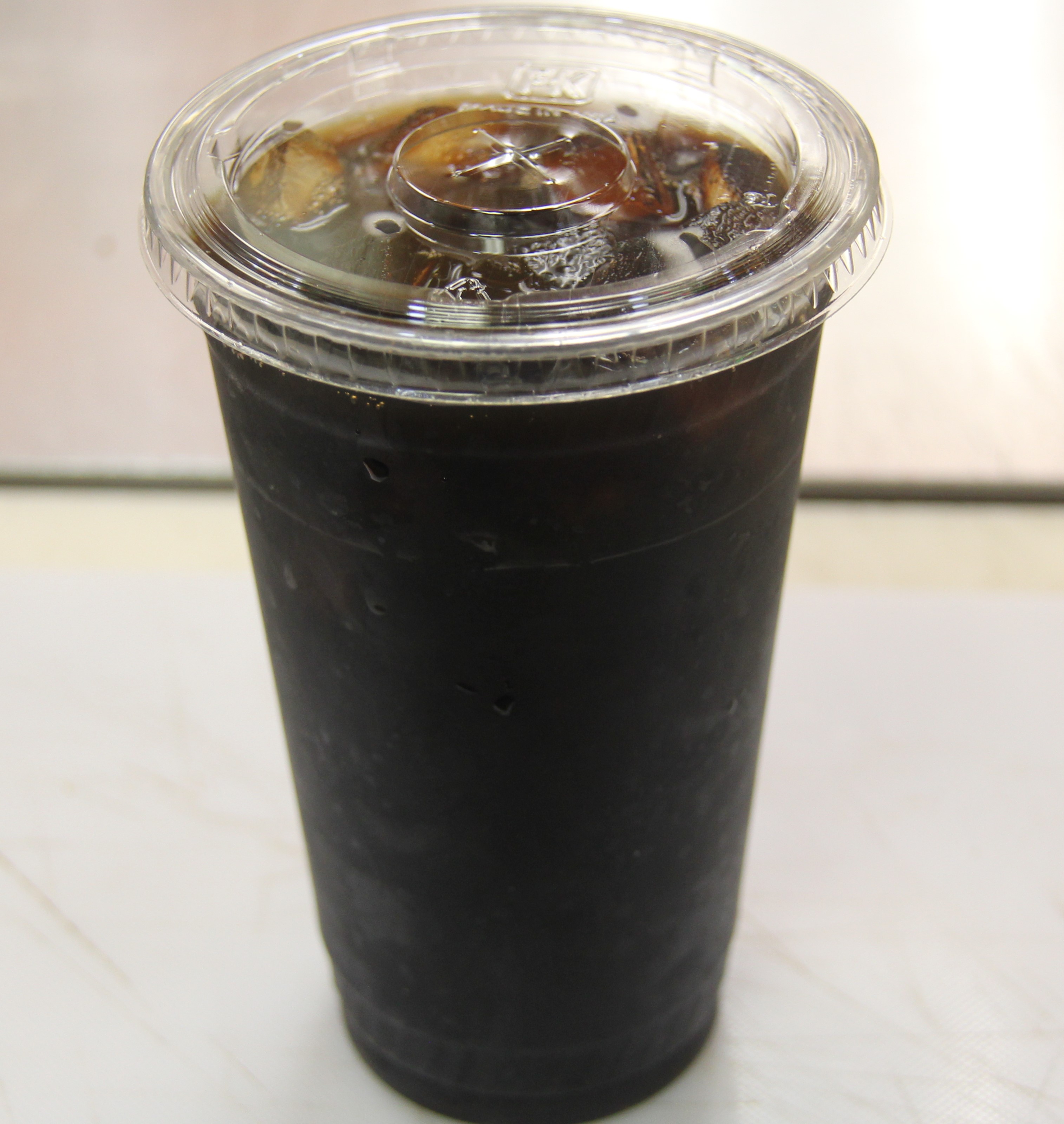 Order 16oz Ice Coffee food online from Happy Donut store, San Francisco on bringmethat.com