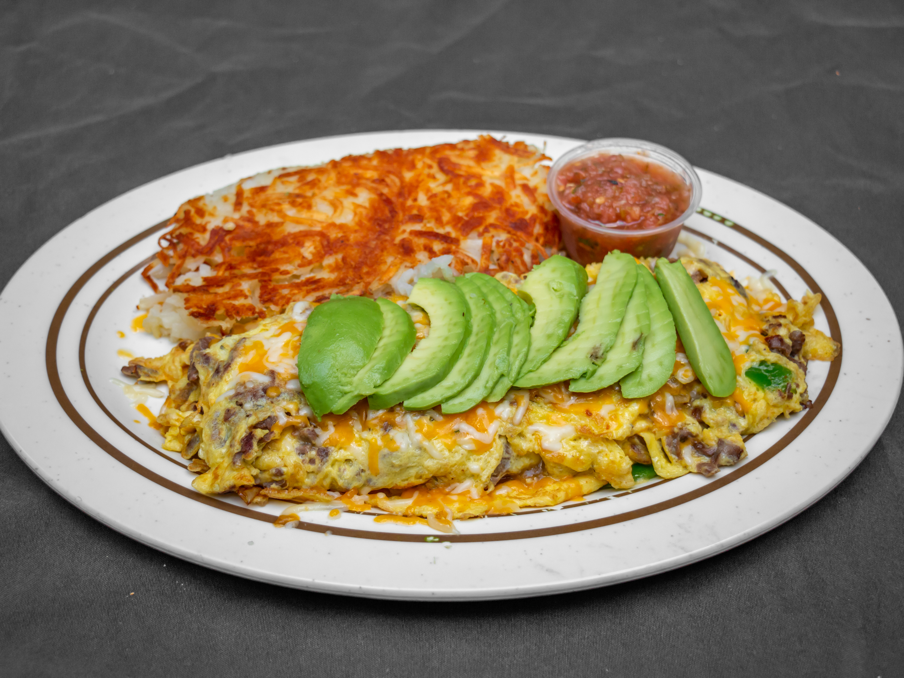 Order Steak Omelette with Avocado food online from The Workz store, Lancaster on bringmethat.com