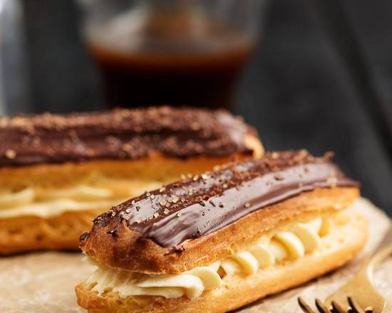 Order French Eclair X-L with Chocolate food online from Valbella Midtown store, New York on bringmethat.com